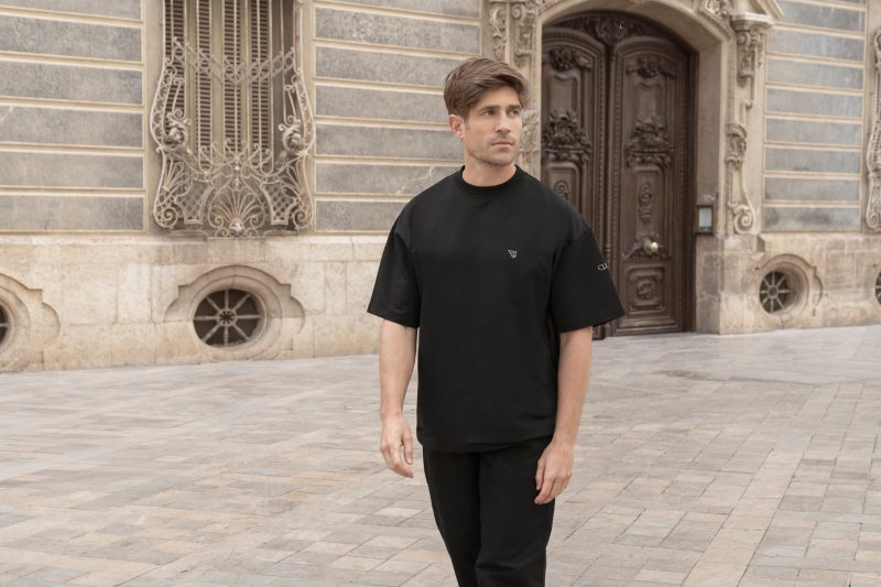 a man standing in front of a building